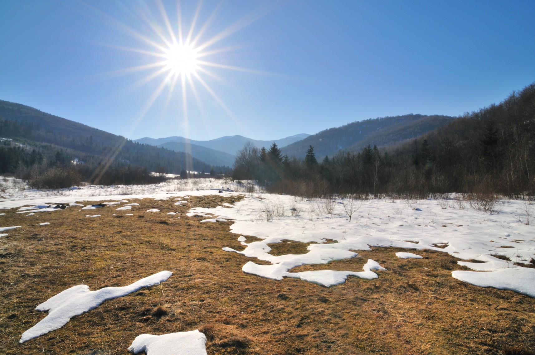 Snow is melting. Melting Snow. Тающий снег фото сверху. Картинка оттепель черно-белая.